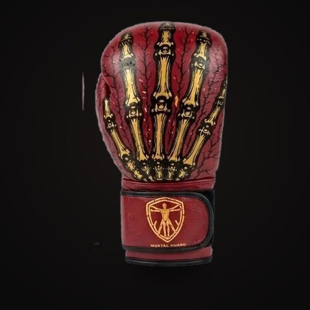 Gants de boxe MG2 Mortal Guard — jointures, cuir rouge, main squelettique dorée, poignet rouge